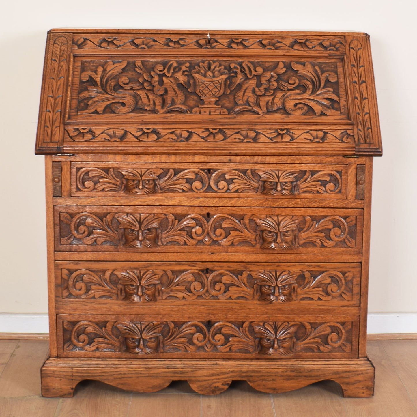 Ornately Carved Oak Greenman Bureau