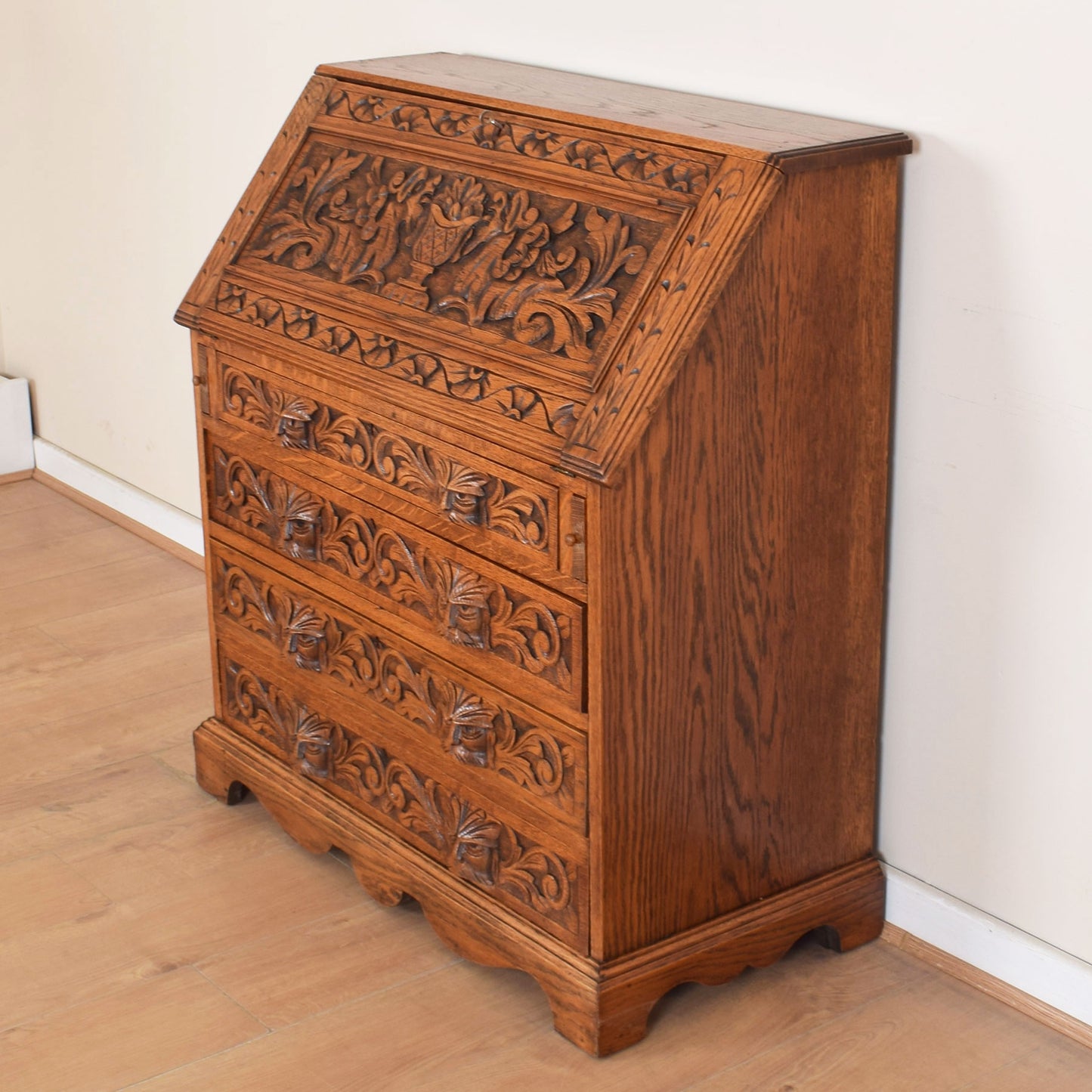 Ornately Carved Oak Greenman Bureau