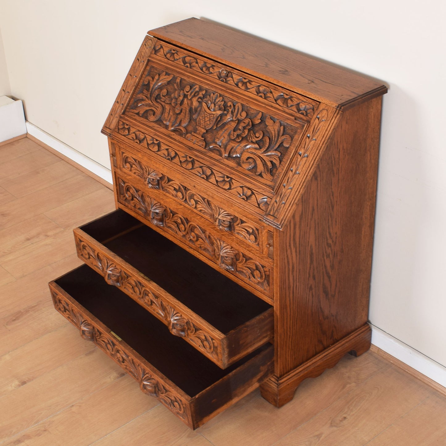 Ornately Carved Oak Greenman Bureau