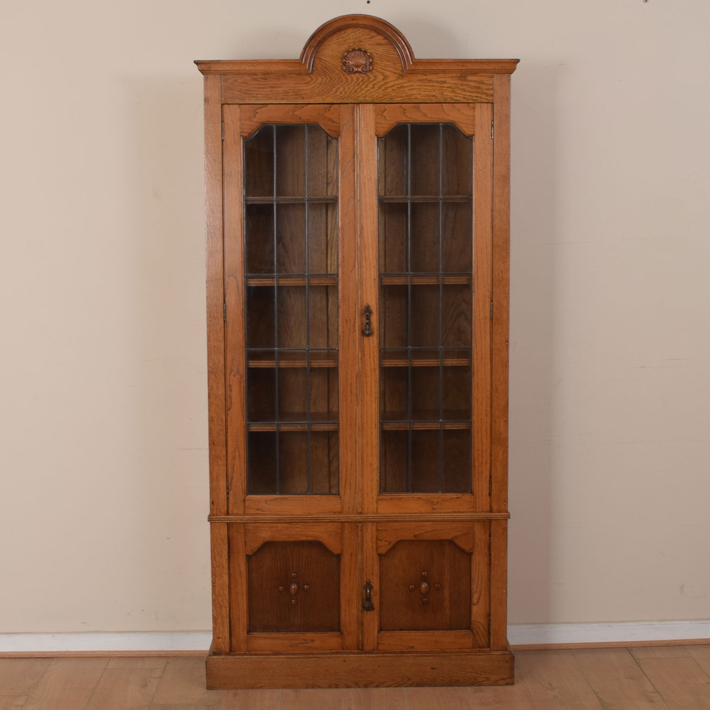 Tall Oak Glazed Bookcase Unit
