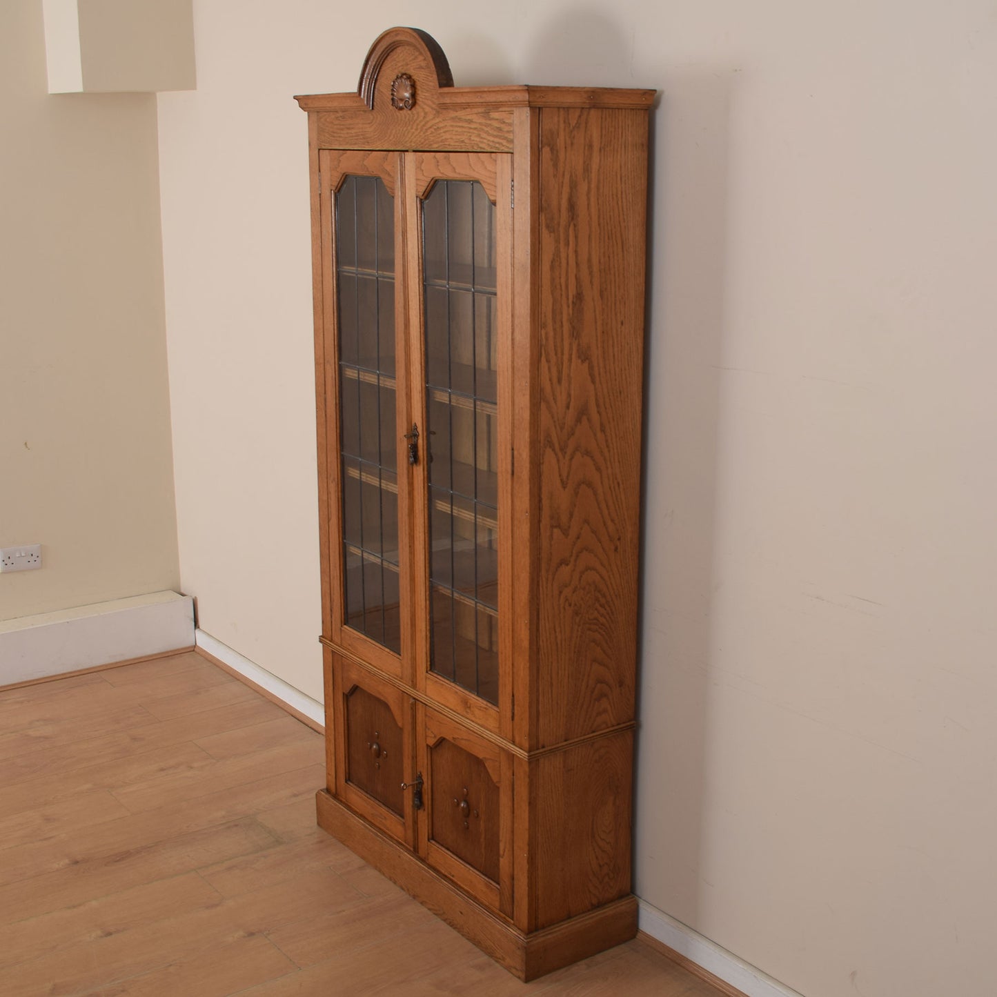 Tall Oak Glazed Bookcase Unit