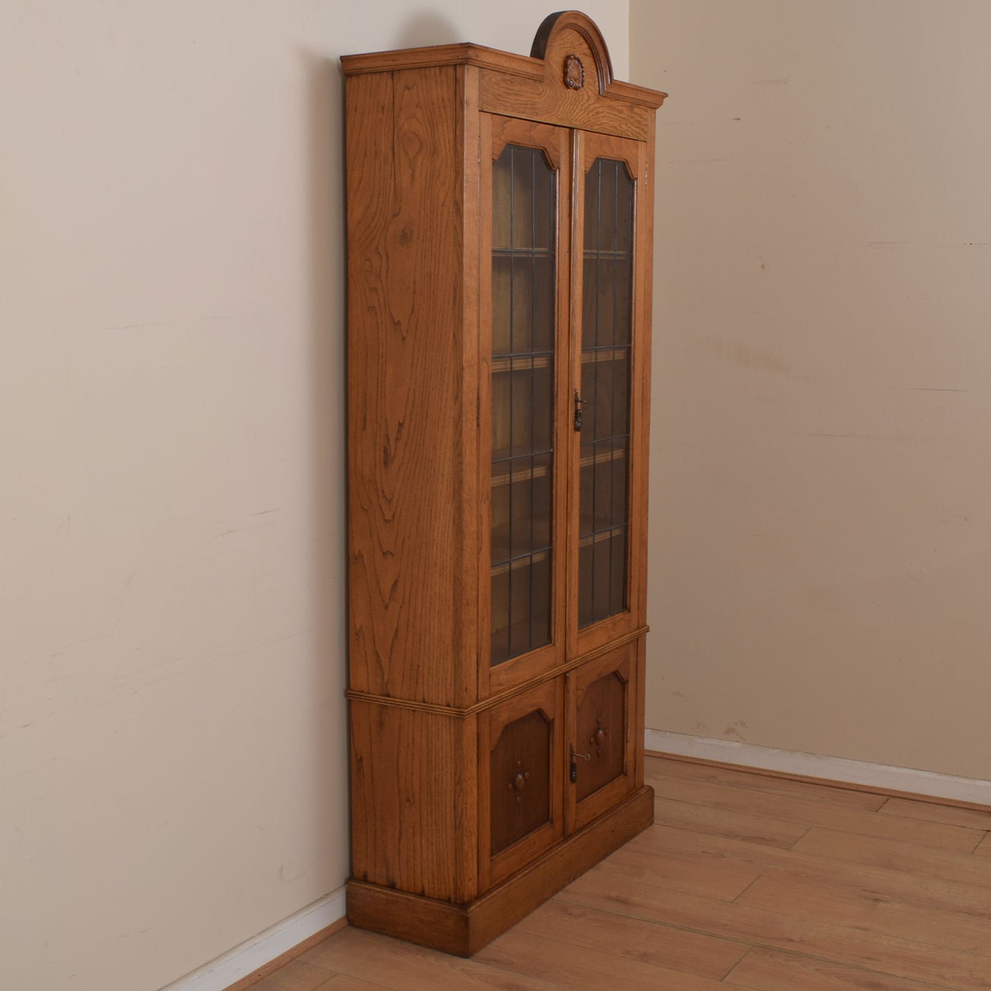 Tall Oak Glazed Bookcase Unit