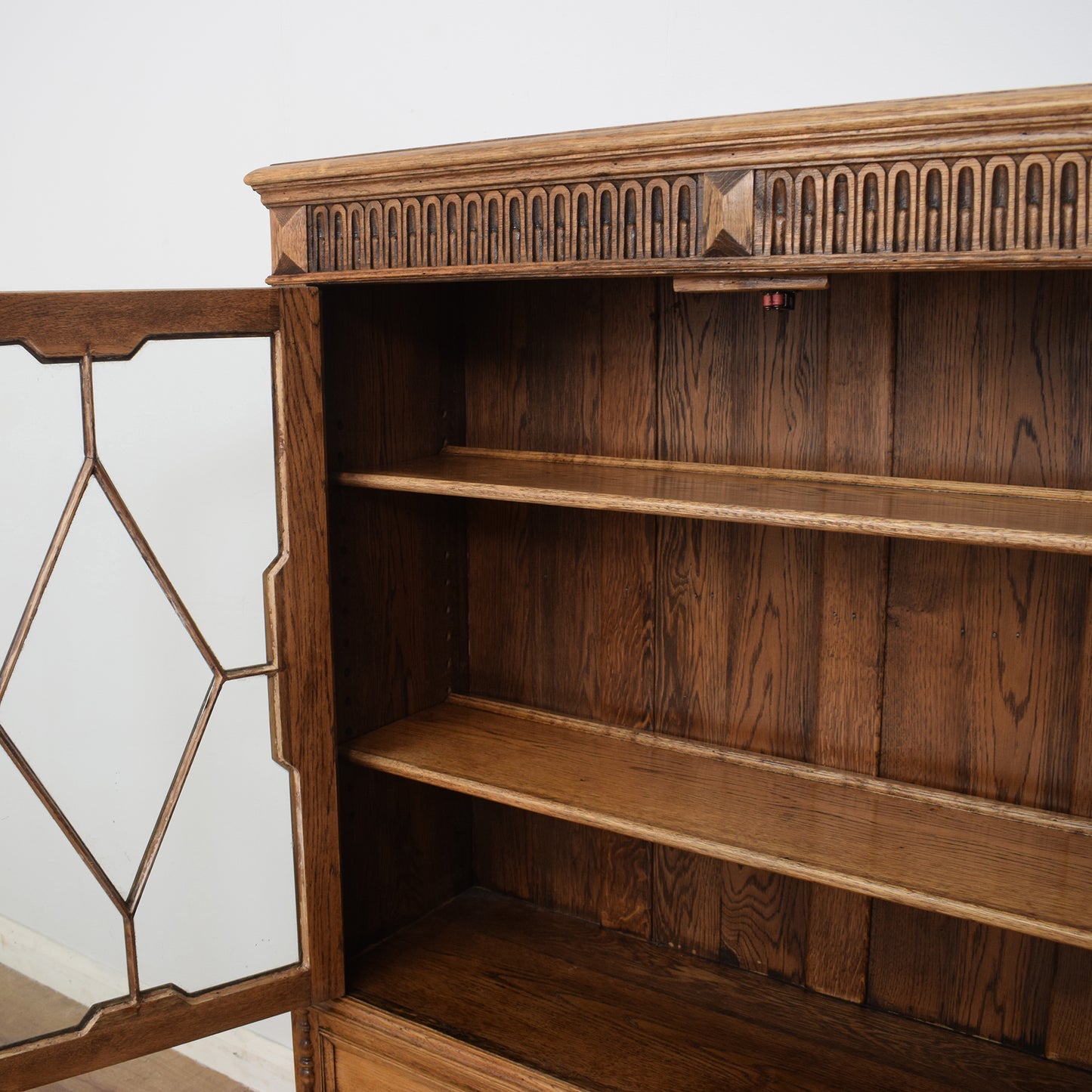 Carved Oak Glazed Cabinet