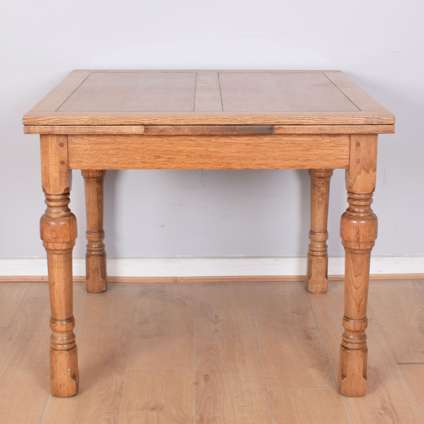 Oak Draw-Leaf Table with Four Chairs