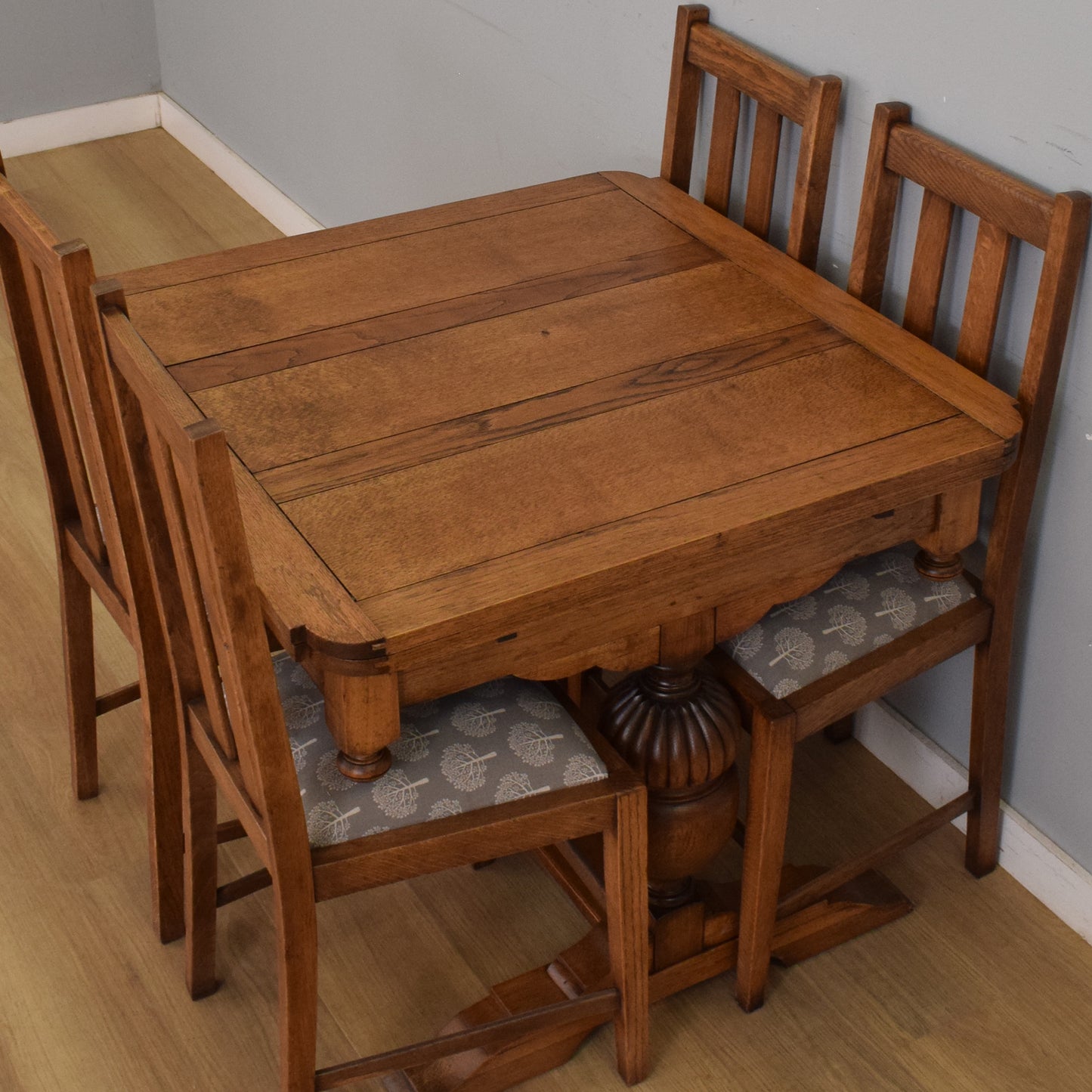 Oak Draw-Leaf Table and Four Chairs