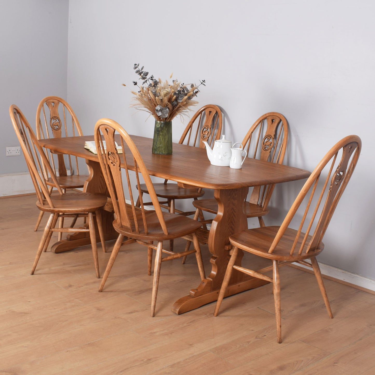 Ercol Dining Table with Six Swan-Back Chairs