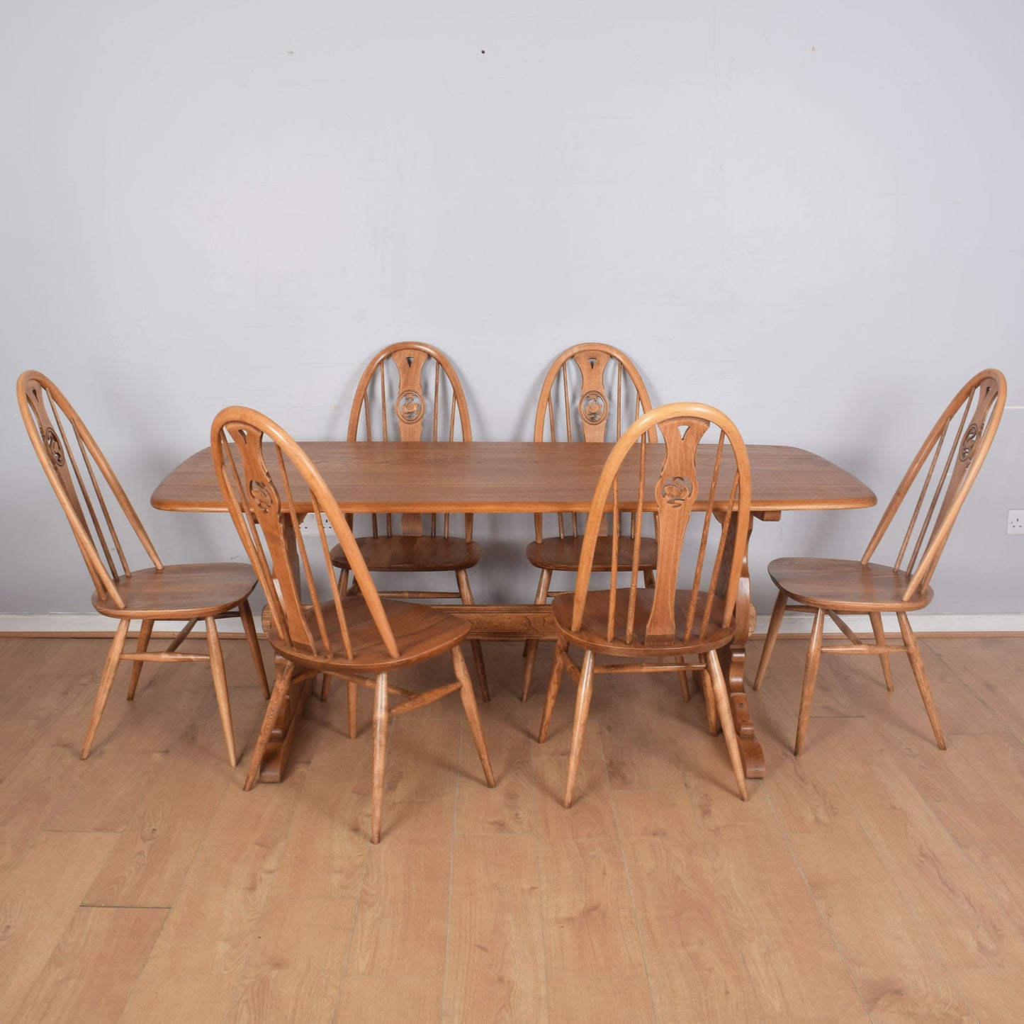 Ercol Dining Table with Six Swan-Back Chairs