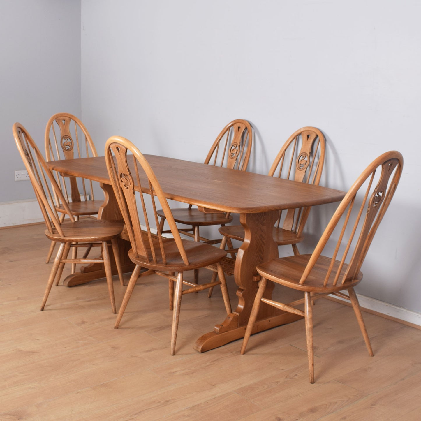 Ercol Dining Table with Six Swan-Back Chairs