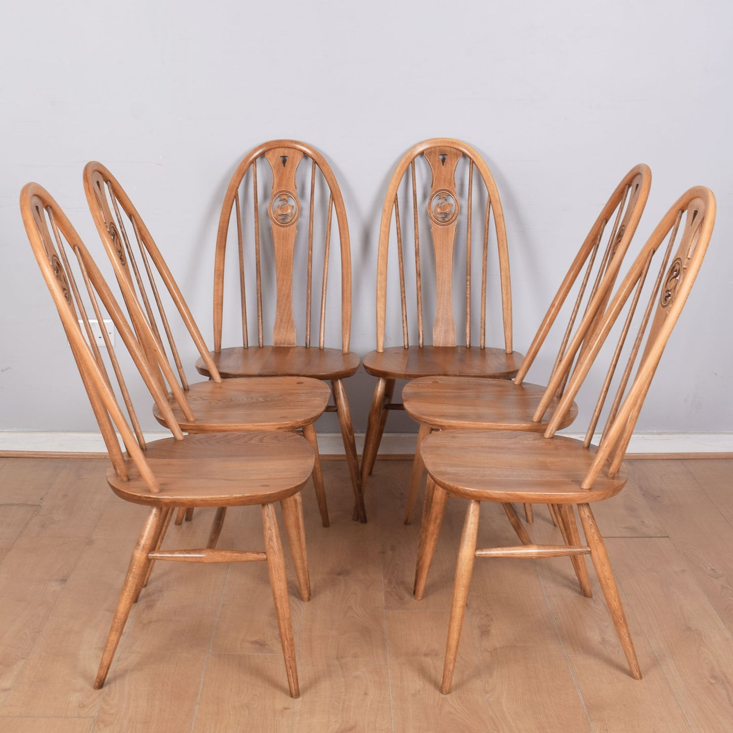 Ercol Dining Table with Six Swan-Back Chairs