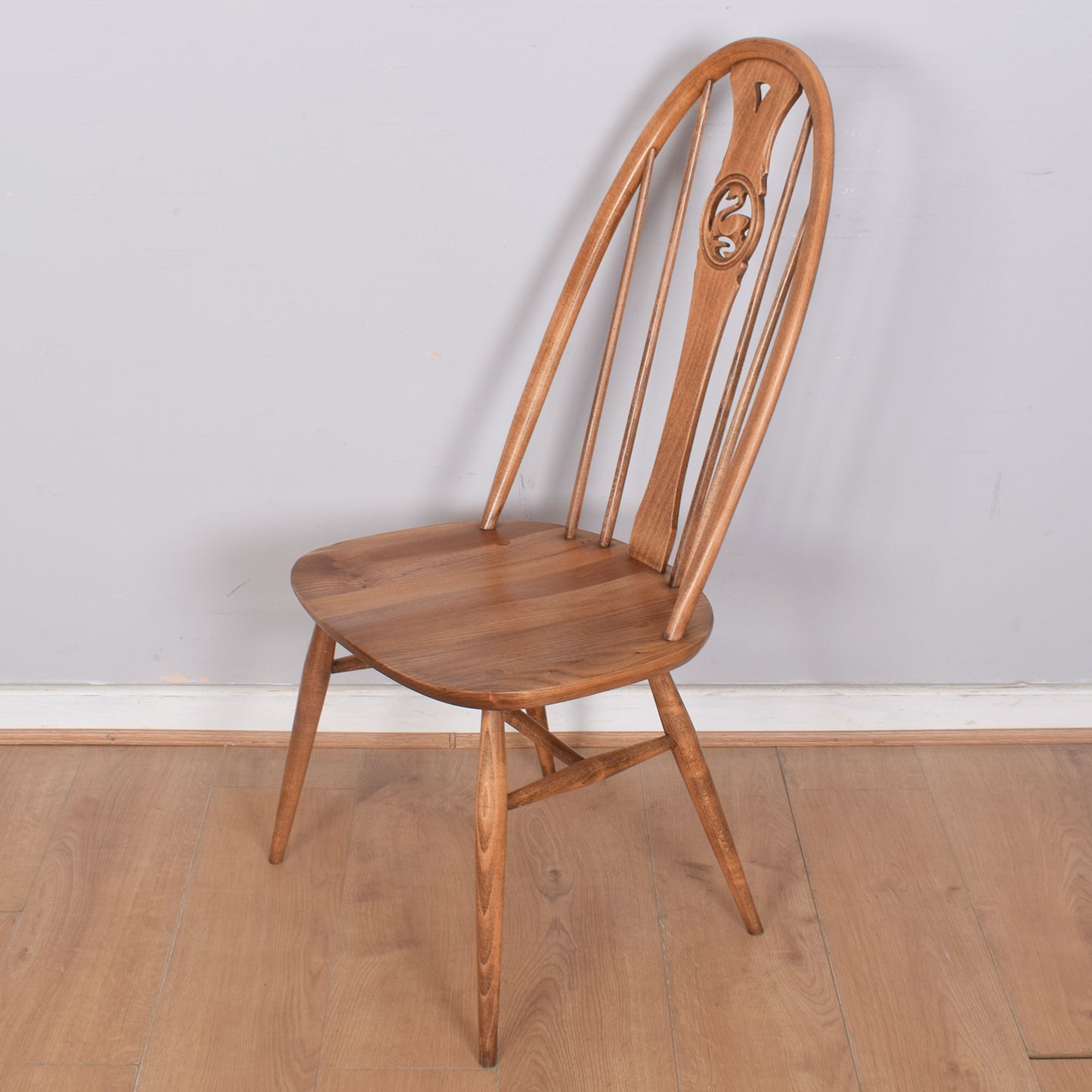 Ercol Dining Table with Six Swan-Back Chairs