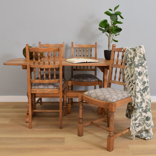 Ercol Trestle Table and Four 'Old Colonial' Chairs