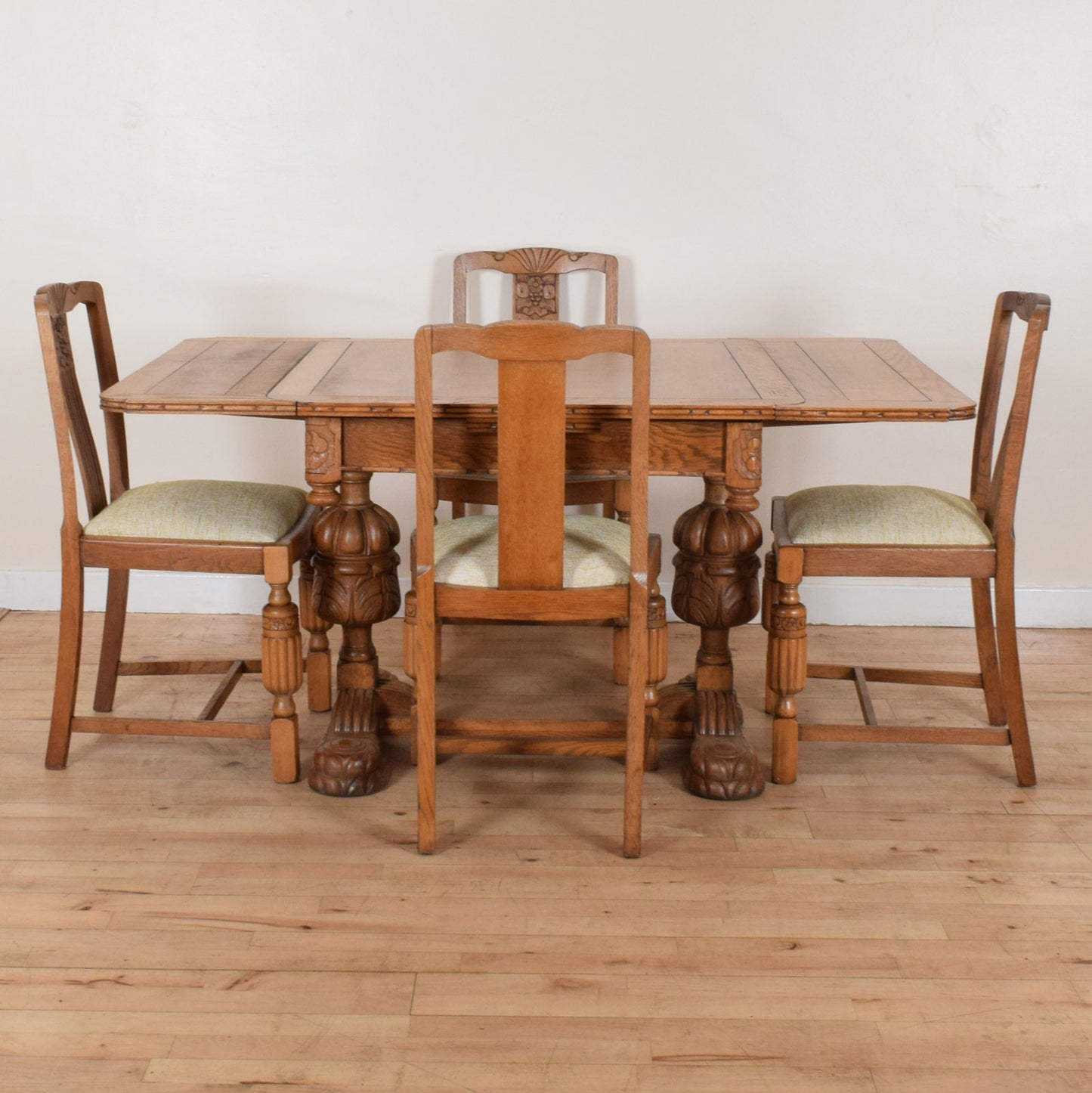 Carved Oak Draw Leaf Table and Four