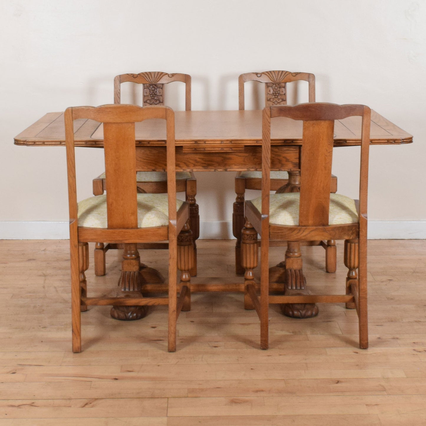 Carved Oak Draw Leaf Table and Four