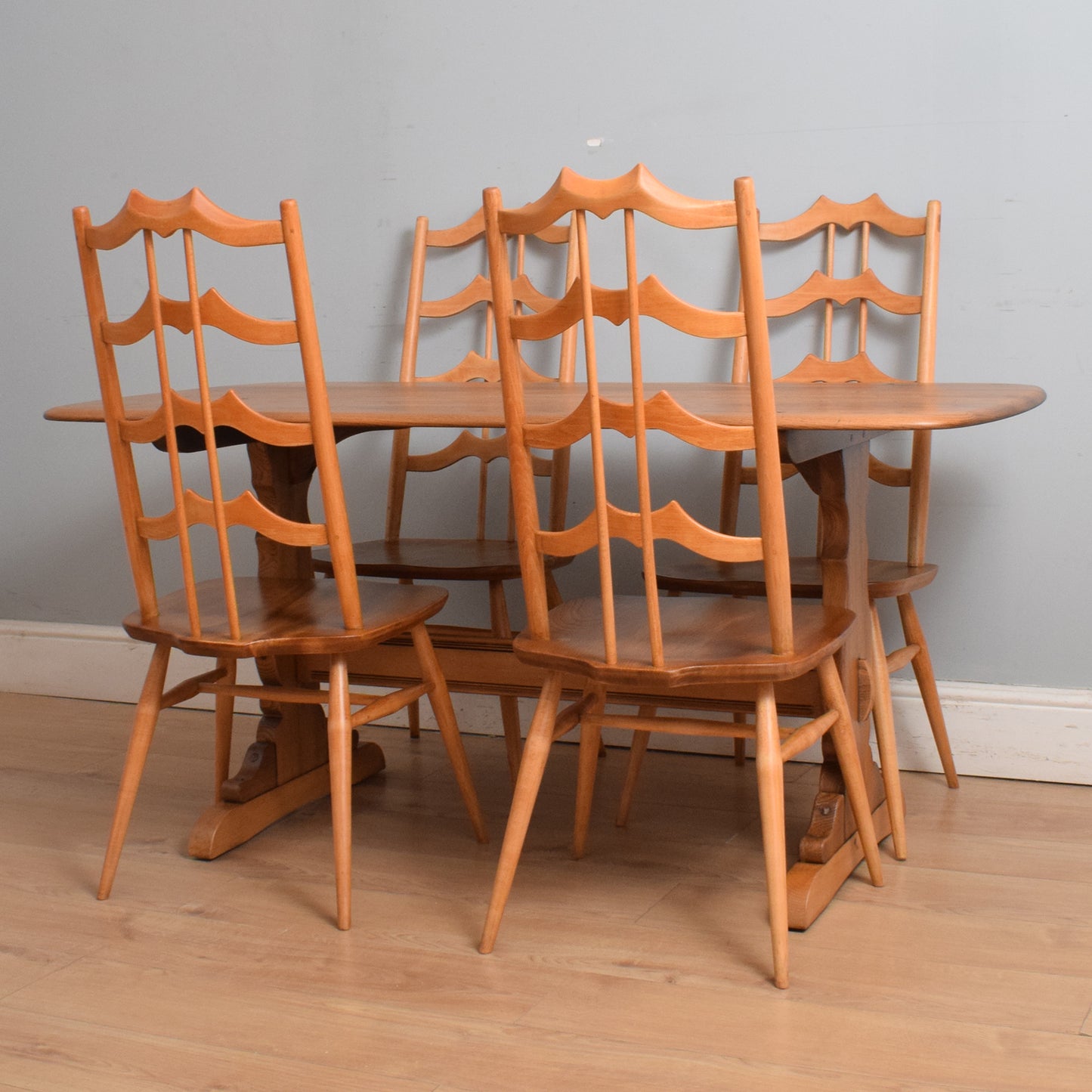 Ercol Trestle Table and Four 'Batwing' Chairs