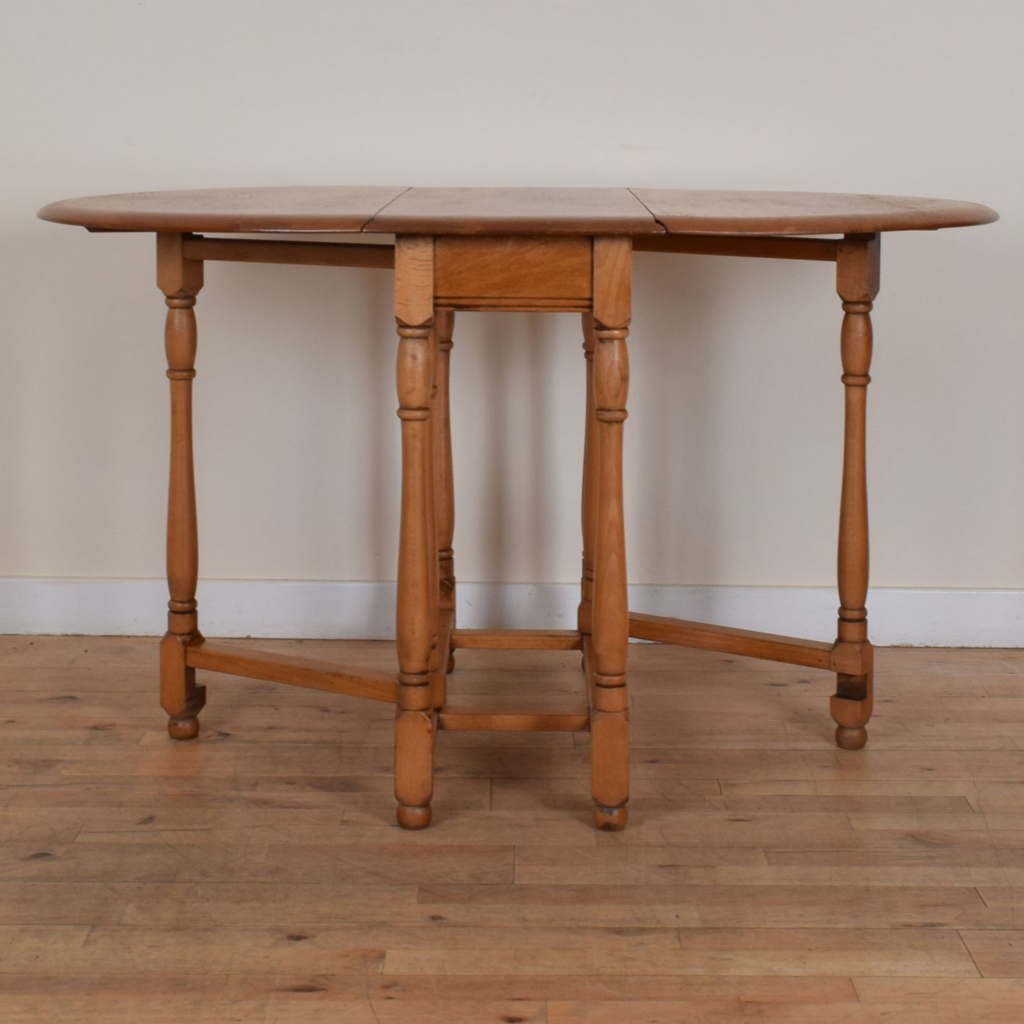 Oak Drop Leaf Table and Two Chairs