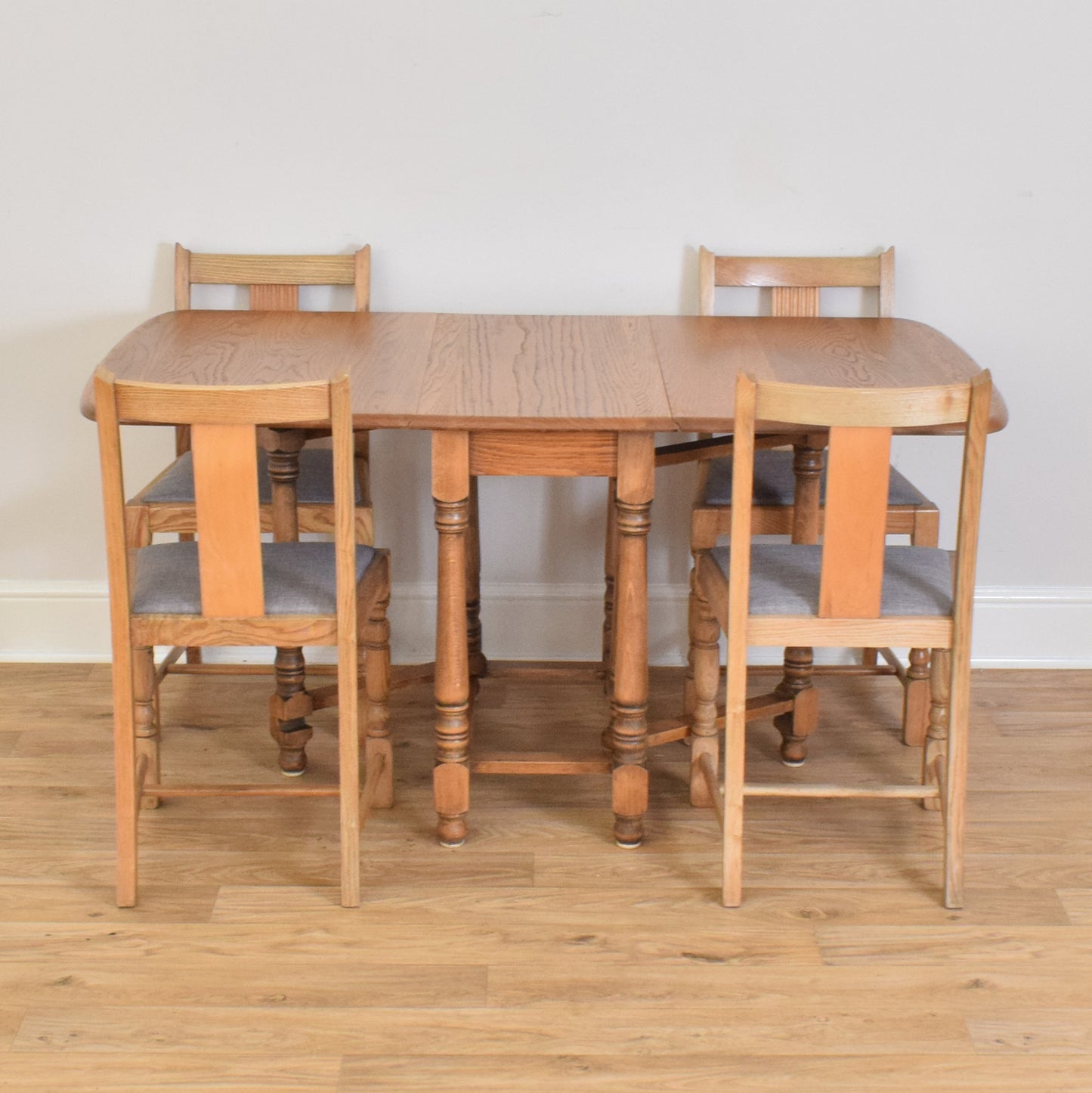 Oak Drop Leaf Table And Four Chairs