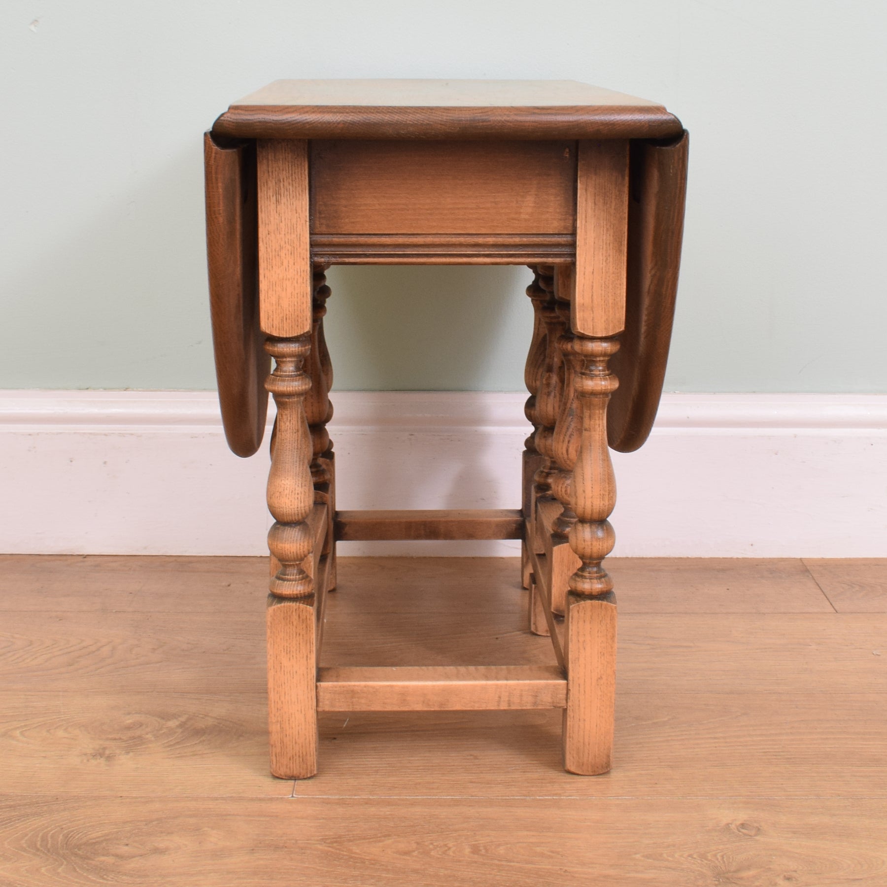 Small drop leaf side shop table